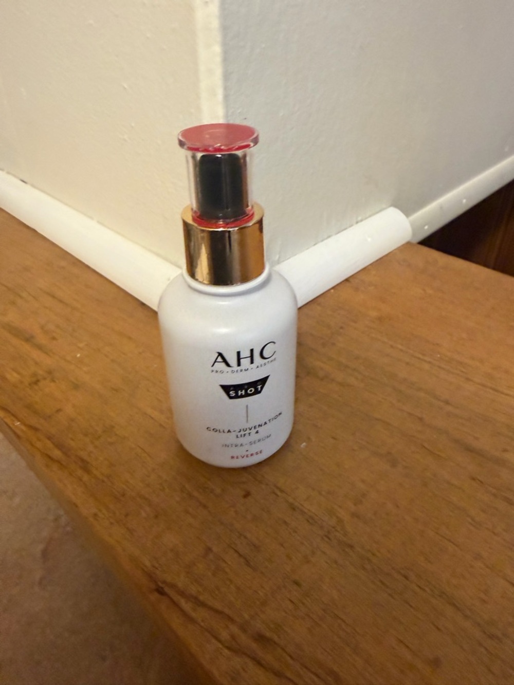 Shot Colla-Juvenate Lift Serum – White Bottle with Gold Accent